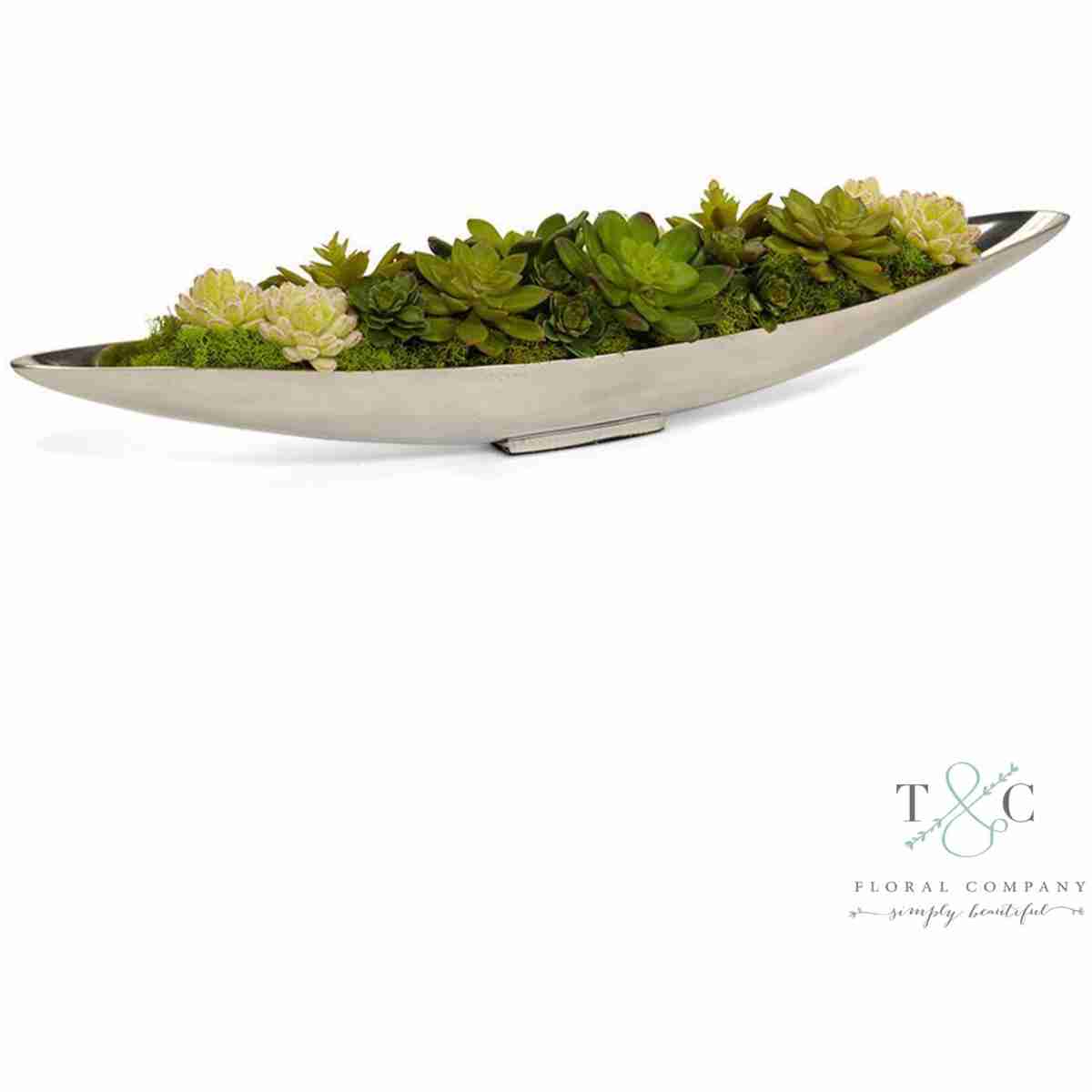 Succulents In Silver Boat - 32L X 8W X 7H Floral Arrangement