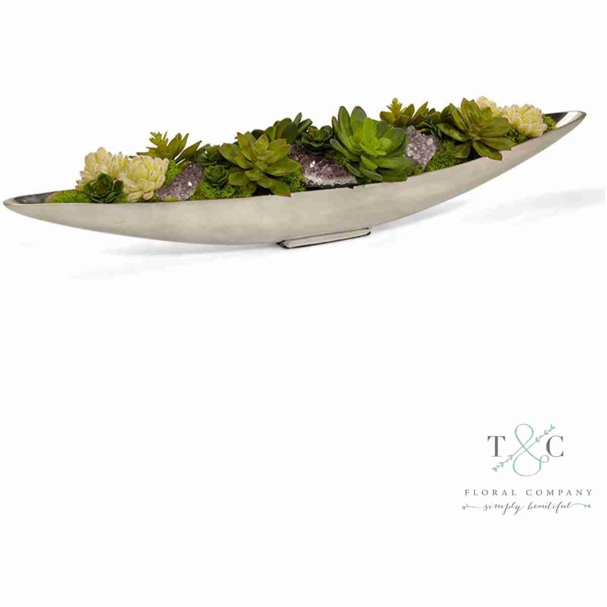 Succulents And Amethyst In Silver Boat - 32L X 8W X 7H Floral Arrangement